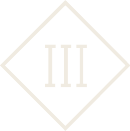 Selo ou distintivo com o numeral romano III