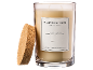 Vela perfumada em frasco de vidro com tampa de cortiça, rotulada 'SUBLIME PATCHOULI'