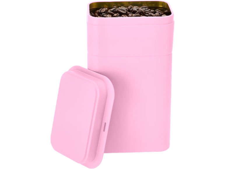 Lata rosa com grãos de café e tampa separada