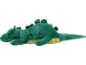 Peluche de dinossauro verde com barriga amarela, deitado de lado.