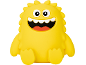 Brinquedo de banho monstro amarelo com um sorriso largo e olhos grandes