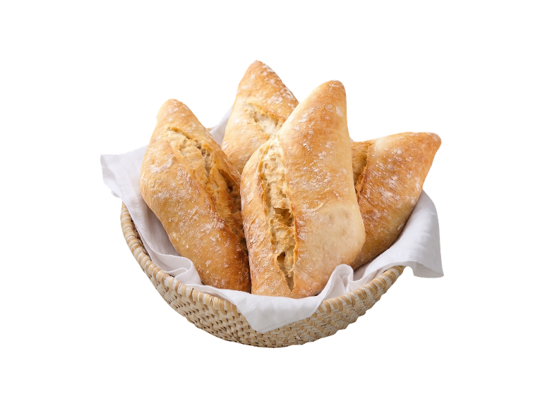 Pão fresco numa cesta com um pano branco.