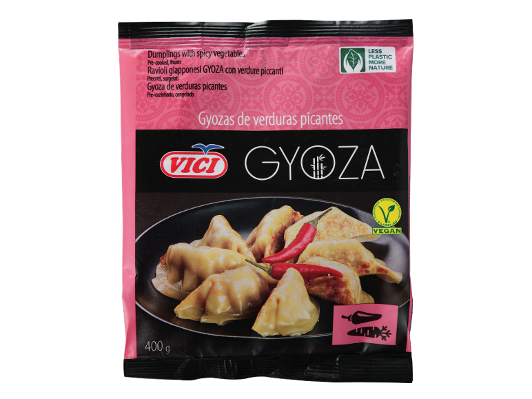Embalagem rosa e preta para dumplings picantes de vegetais, 400g, com selo vegan.