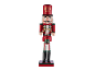 Quebra-nozes de madeira com uniforme vermelho e verde, tocando um tambor, sobre uma base vermelha.