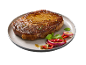 Bife de vaca suculento com vegetais grelhados e ervas num prato.