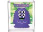 Monstro roxo de quatro olhos com chifres verdes e texto 'TINKOO' numa caixa transparente.
