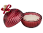 Vela perfumada vermelha com tampa decorada com sinos e laço.