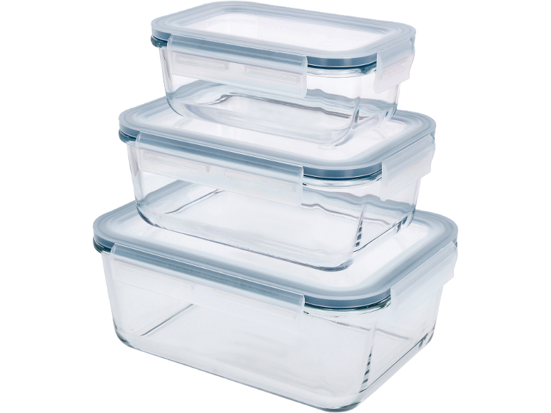 Conjunto de três recipientes de vidro empilhados com tampas de plástico transparente.