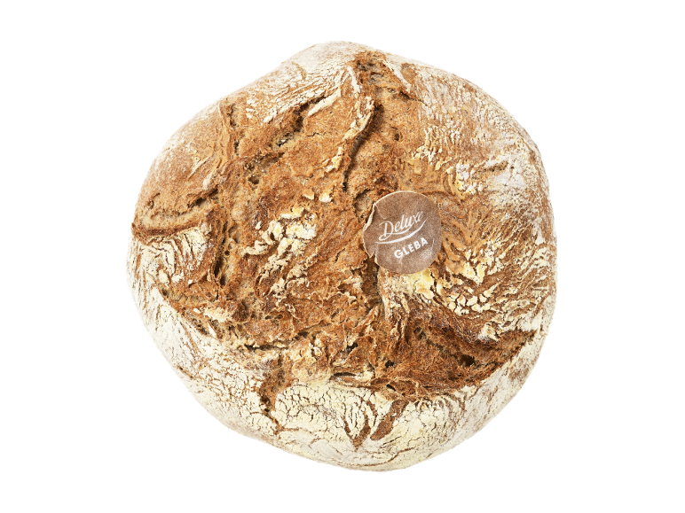 Pão redondo Deluxe Gleba com crosta crocante, polvilhado com farinha.