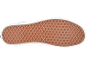 Sola de borracha marrom de um tênis esportivo com padrão de waffle