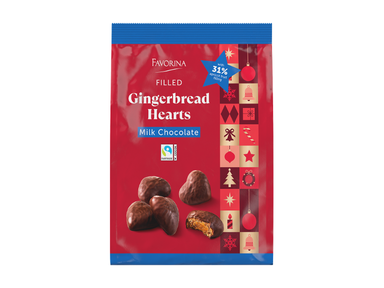 Corações de pão de mel em chocolate de leite com recheio de alperce, embalagem festiva.