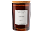 Vela perfumada de vidro marrom com tampa de cortiça, rotulada 'Sage Serenity'.