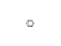 Uma porca hexagonal de metal sobre um fundo preto.