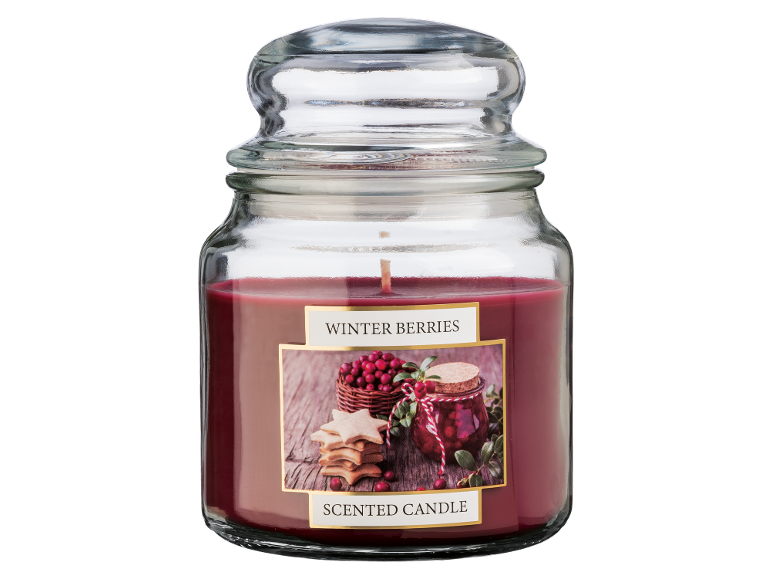 Vela perfumada de bagas de inverno num frasco de vidro com tampa.