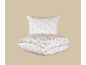 Conjunto de roupa de cama com almofada e edredão em padrão floral branco e bege.
