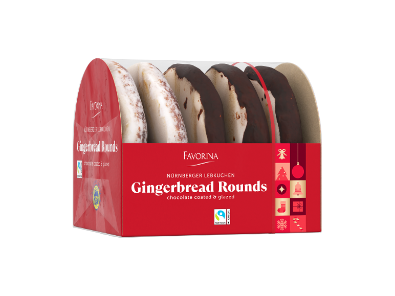 Biscoitos de gengibre redondos, cobertos de chocolate e glacê, em embalagem vermelha com motivos natalícios.