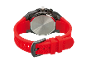 Parte de trás de um relógio com bracelete de silicone vermelha e fivela de metal.