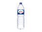 Garrafa de água mineral com rótulo azul e gotas de água.