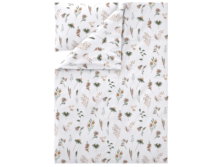 Capa de edredão e fronha com padrão floral em tons terrosos.