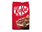 Embalagem vermelha de cereais com uma tigela de cereais de chocolate em leite e espigas de trigo.