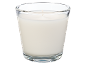 Vela branca num copo de vidro.