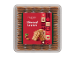 Pacote de biscoitos de folhas de amêndoa com um rótulo temático de Natal.