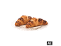Dois croissants dourados com pedaços de chocolate num prato branco. [imagem gerada por IA]