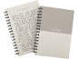Dois cadernos de espiral, um com o texto 'NOTEBOOK' e um padrão, o outro com 'NOTES' e design bicolor.