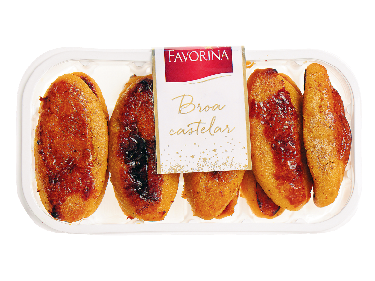 Favorina Broa Castelar numa bandeja branca, produtos de pastelaria dourados com acabamento brilhante.