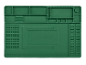 Tapete de reparação de silicone verde com compartimentos, áreas magnéticas e uma régua, com o texto '/// PARKSIDE'.