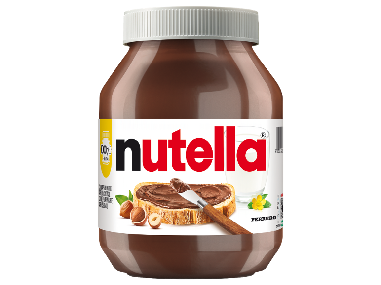 Frasco grande de creme de chocolate e avelã, pão e um copo de leite.