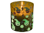 Vela perfumada em frasco de vidro com motivos de Halloween: abóboras, fantasmas e teias de aranha.