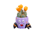 Cato florido num vaso roxo em forma de monstro de Halloween.
