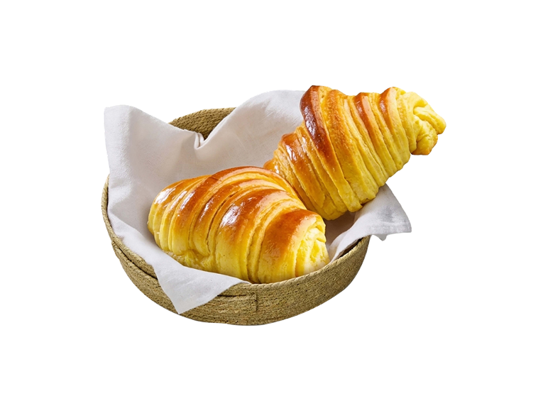 Dois croissants dourados numa cesta de vime com um guardanapo branco.