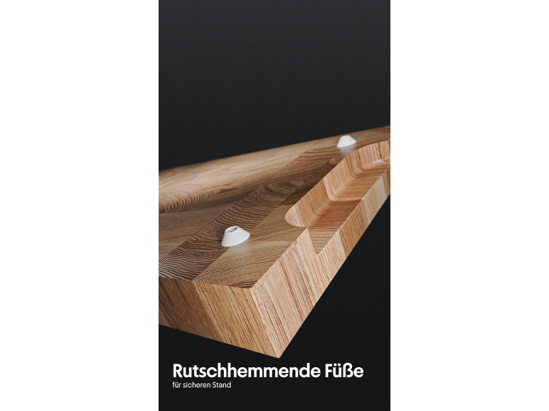 Tábua de corte de madeira com pés antiderrapantes e o texto 'Rutschhemmende Füße für sicheren Stand'.