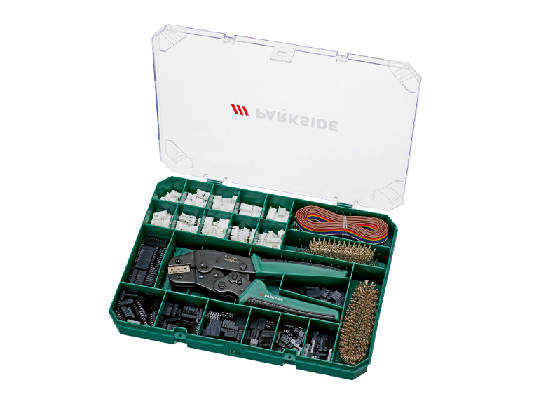 Kit de crimpagem com alicate, conectores e fios numa caixa verde.