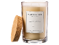 Vela perfumada em frasco de vidro com tampa de cortiça, rotulada 'Sublime Patchouli'.
