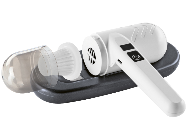 Aspirador de mão sem fios branco com filtro visível e base de carregamento.