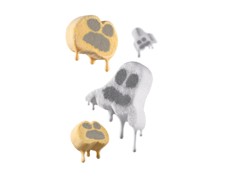 Gelados derretidos em forma de pata e fantasma com fumo em fundo preto.