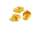 Três croissants dourados e brilhantes sobre um fundo preto.