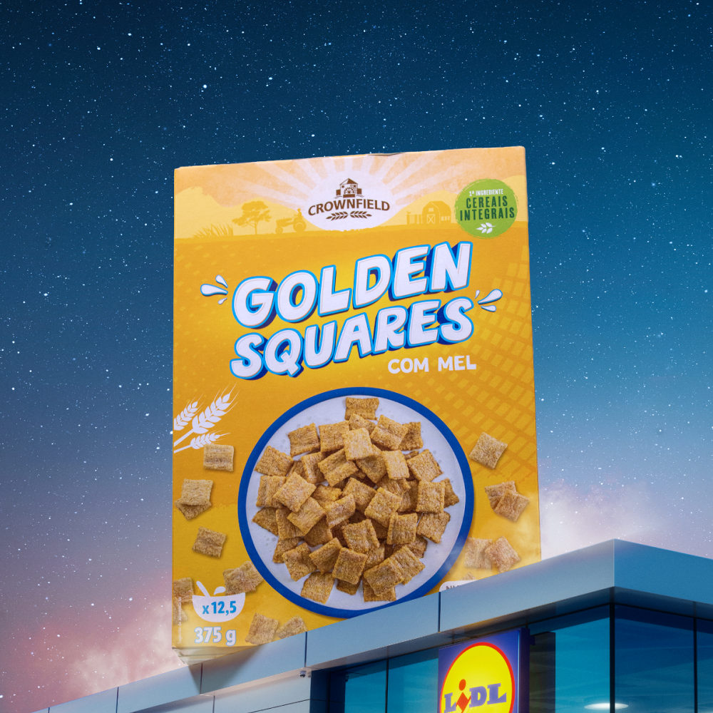 Caixa gigante de cereais Crownfield Golden Squares com mel no topo de um edifício Lidl.