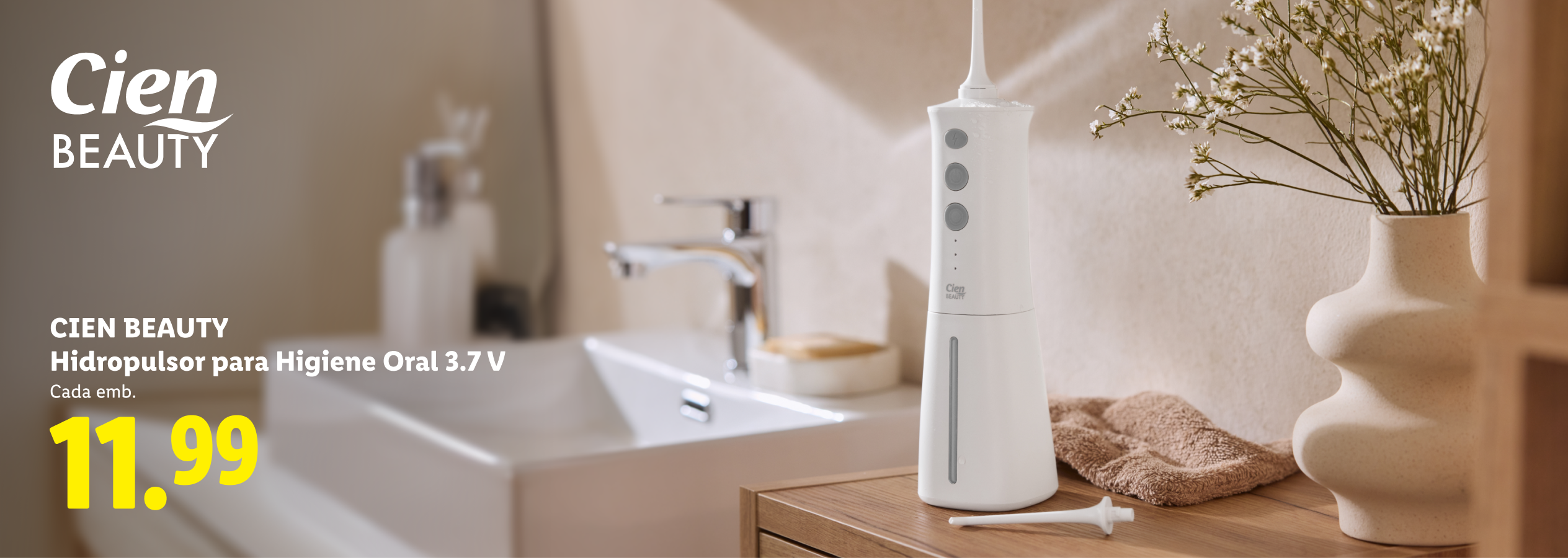 Hidropulsor oral branco com preço de 11,99€, em ambiente de casa de banho.