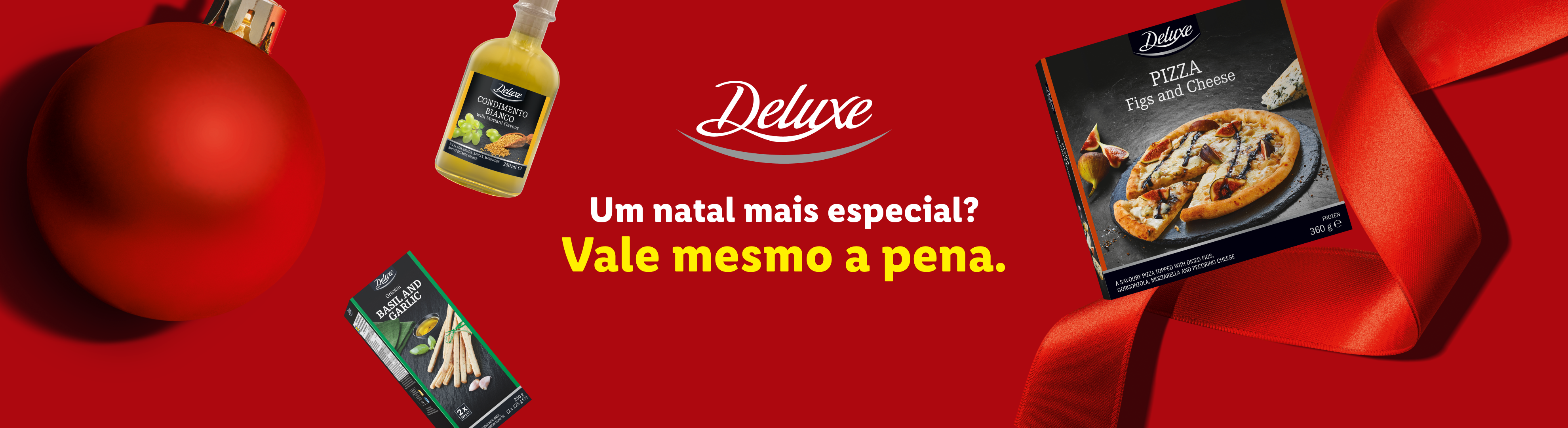 Deluxe: Pizza de figos e queijo, tempero branco e grissini de manjericão e alho, com decoração de Natal.