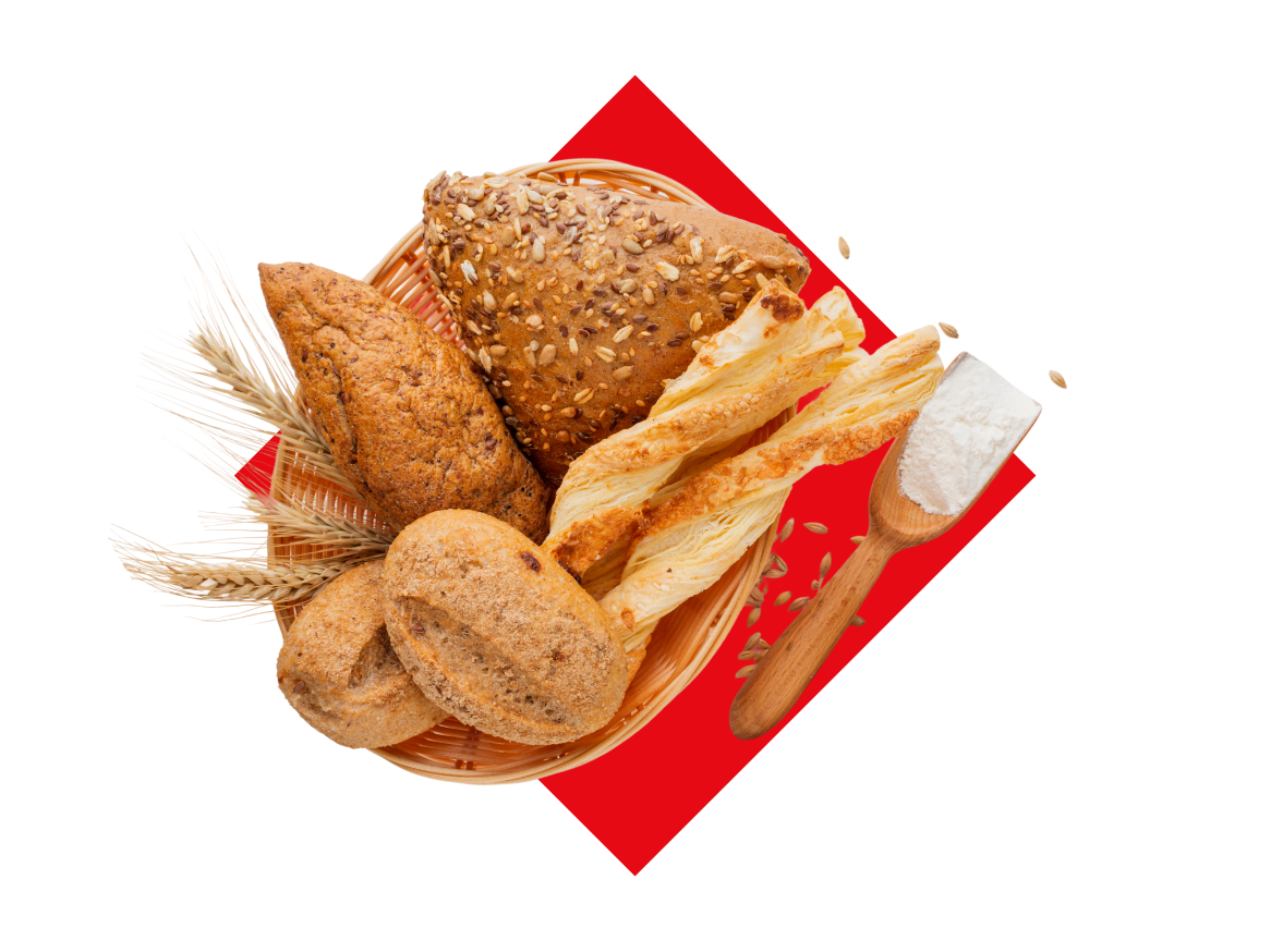 Cesta de pães artesanais, incluindo pão integral, sementes e palitos de massa folhada, com farinha e trigo.