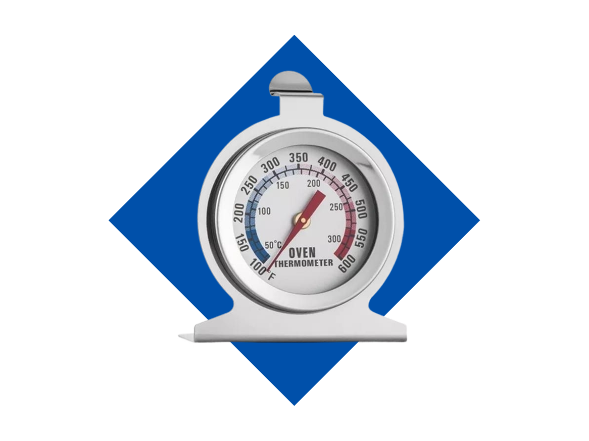 Termômetro de forno de metal mostrando 200°C.