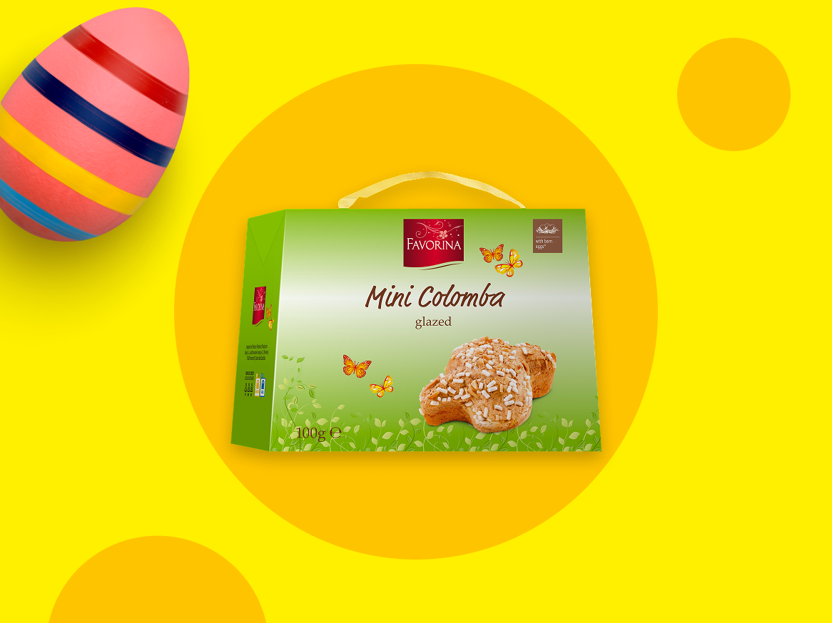 Ovo da Páscoa e embalagem de mini colomba vidrada com borboletas e folhas.
