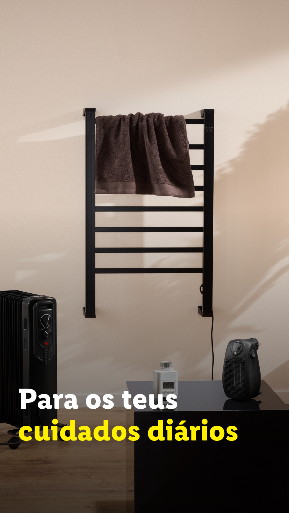 Toalheiro elétrico preto com toalha, aquecedor a óleo e aquecedor de ventoinha, com o texto 'Para os teus cuidados diários'.