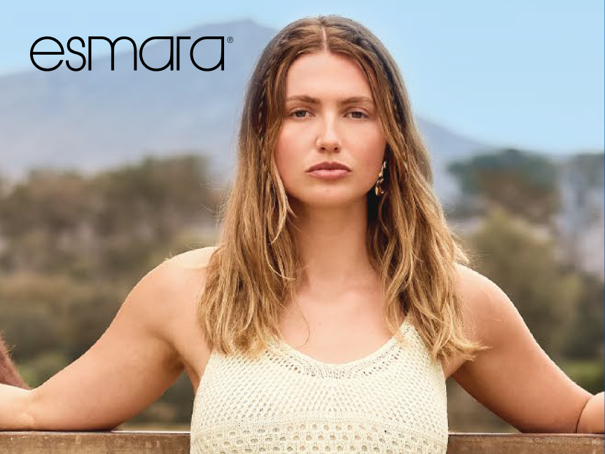 Modelo usando top de crochê Esmara em cenário rural.