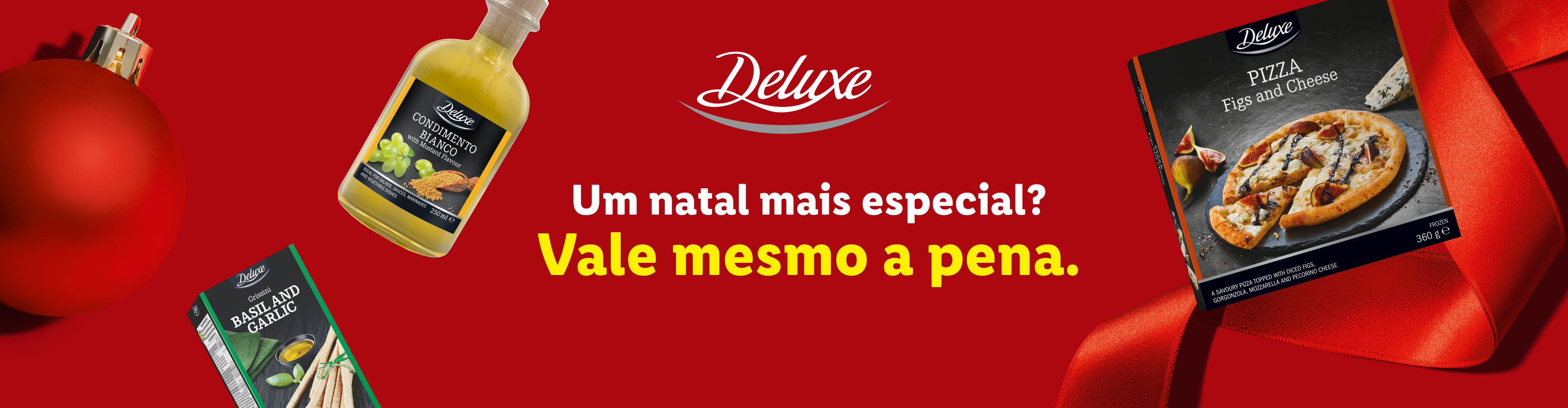 Deluxe: pizza de figos e queijo, grissini de manjericão e alho, e condimento branco, com tema natalício.