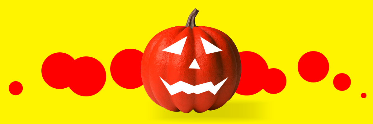 Uma abóbora de Halloween vermelha em um fundo de círculos vermelhos.